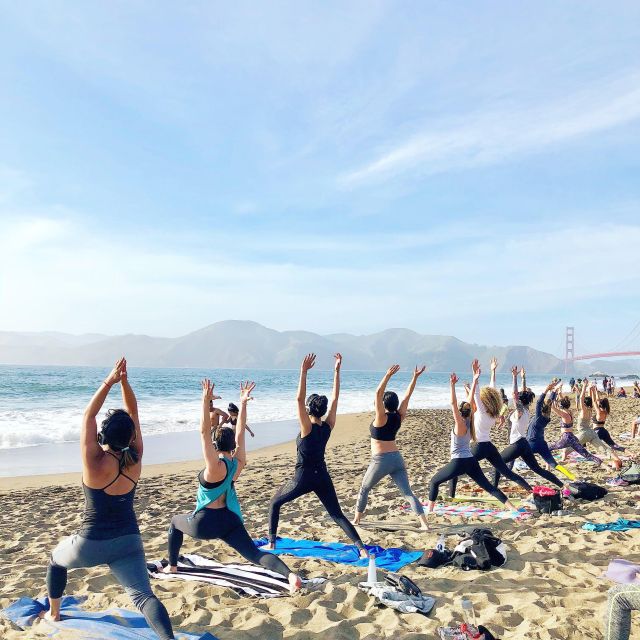 San Francisco: Silent Disco Yoga at Baker Beach - Outdoor yoga reality check: sand, balance, and comfort