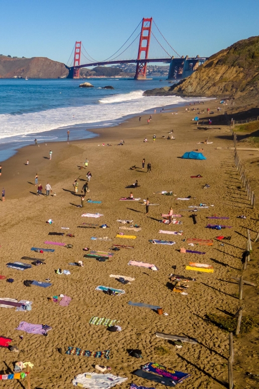 San Francisco: Silent Disco Yoga at Baker Beach - Baker Beach yoga with Golden Gate Bridge views (the big reason to go)